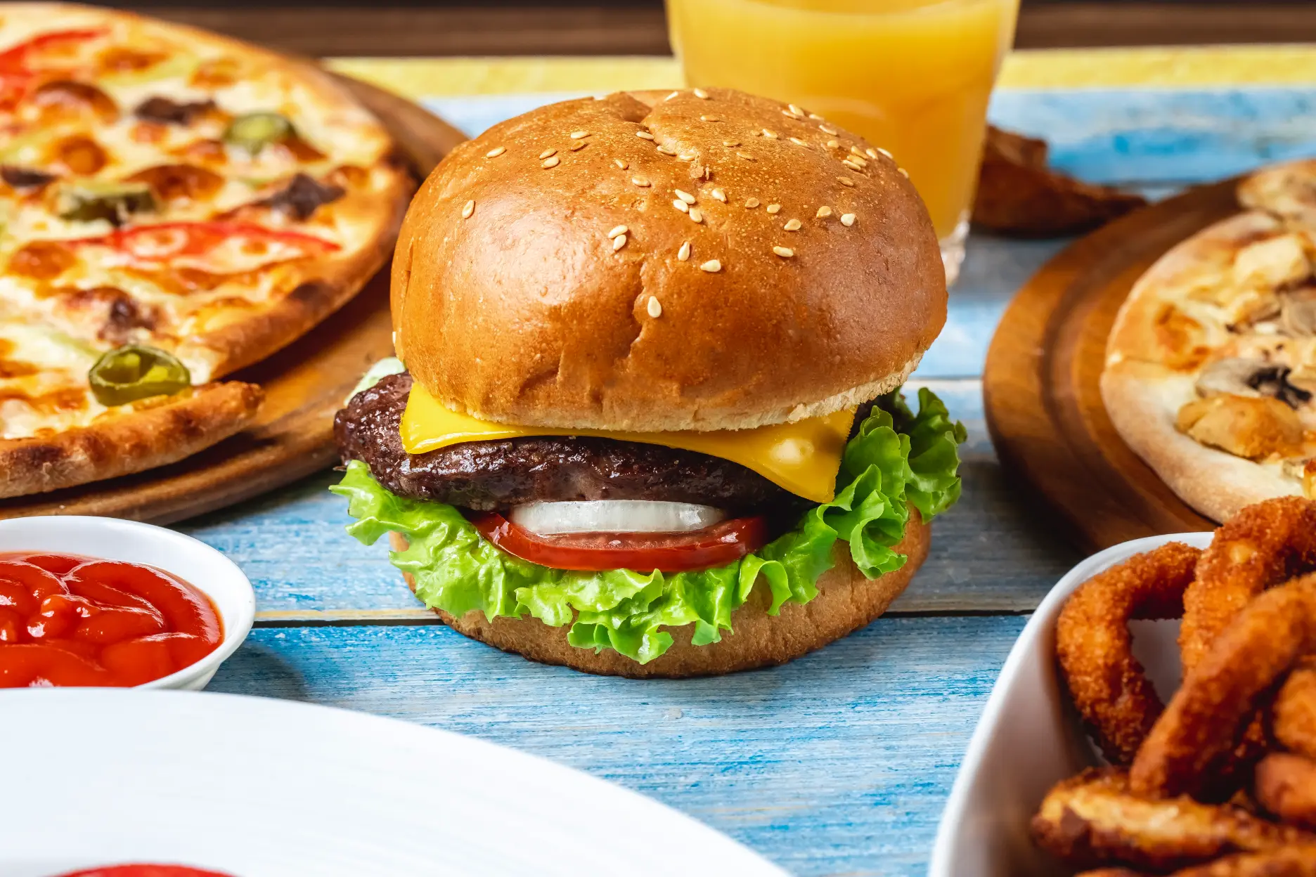 beef-burger-meat-lettuce-tomato-cheese-side-view